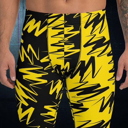 Black and yellow patterned men's wrestling tights closeup view.