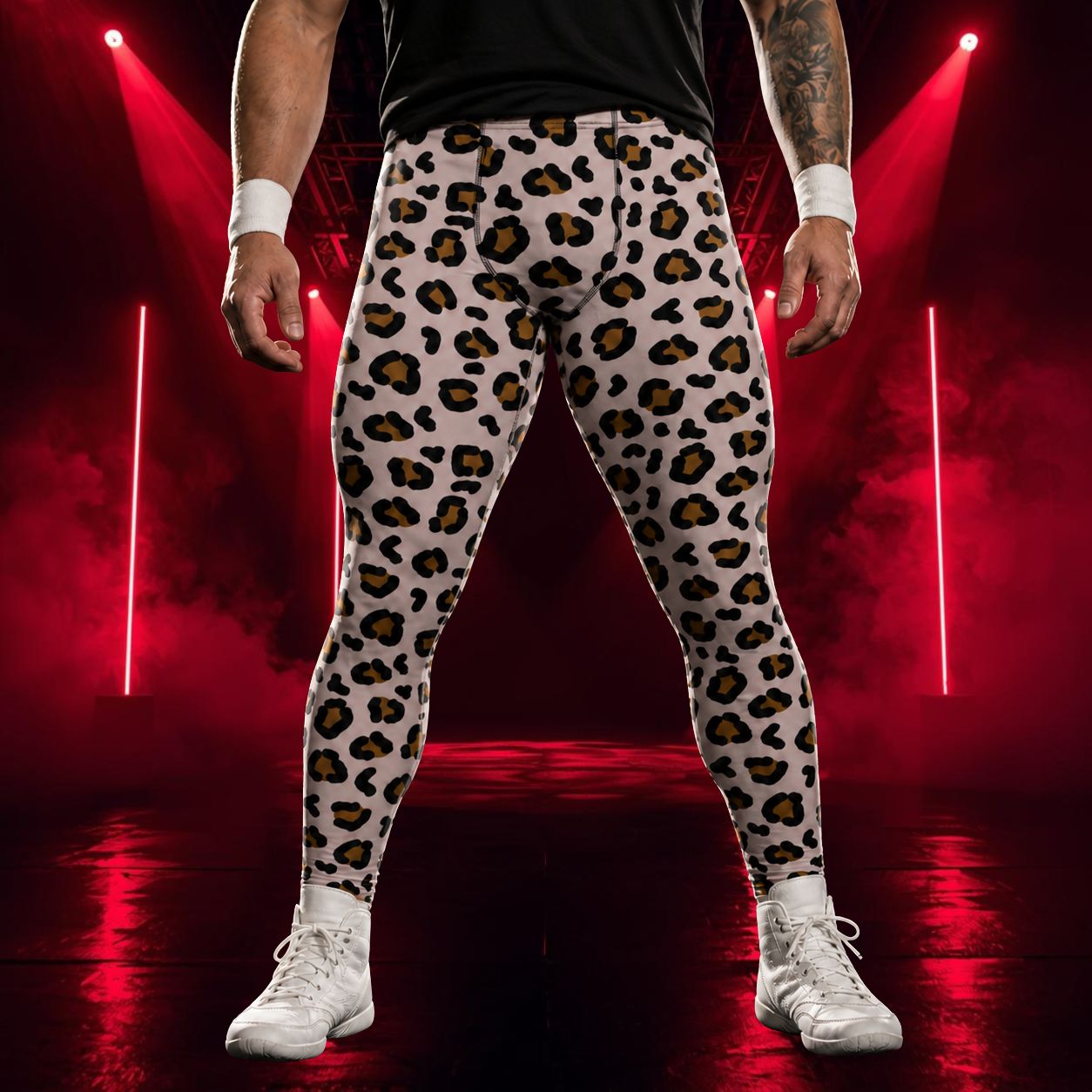 Person wearing leopard print pants on a dark background with red lights