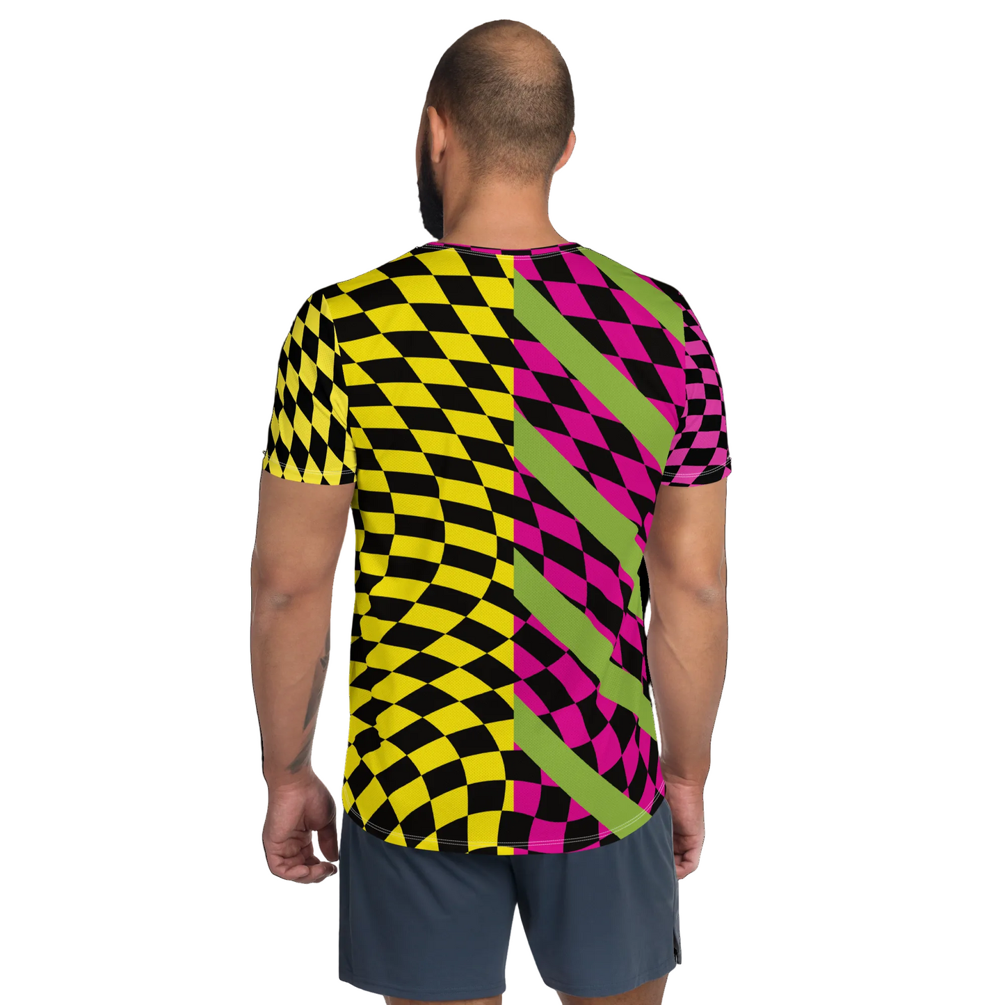 Man wearing geometric pink and yellow athletic t-shirt in split design with diagonal green stripes
