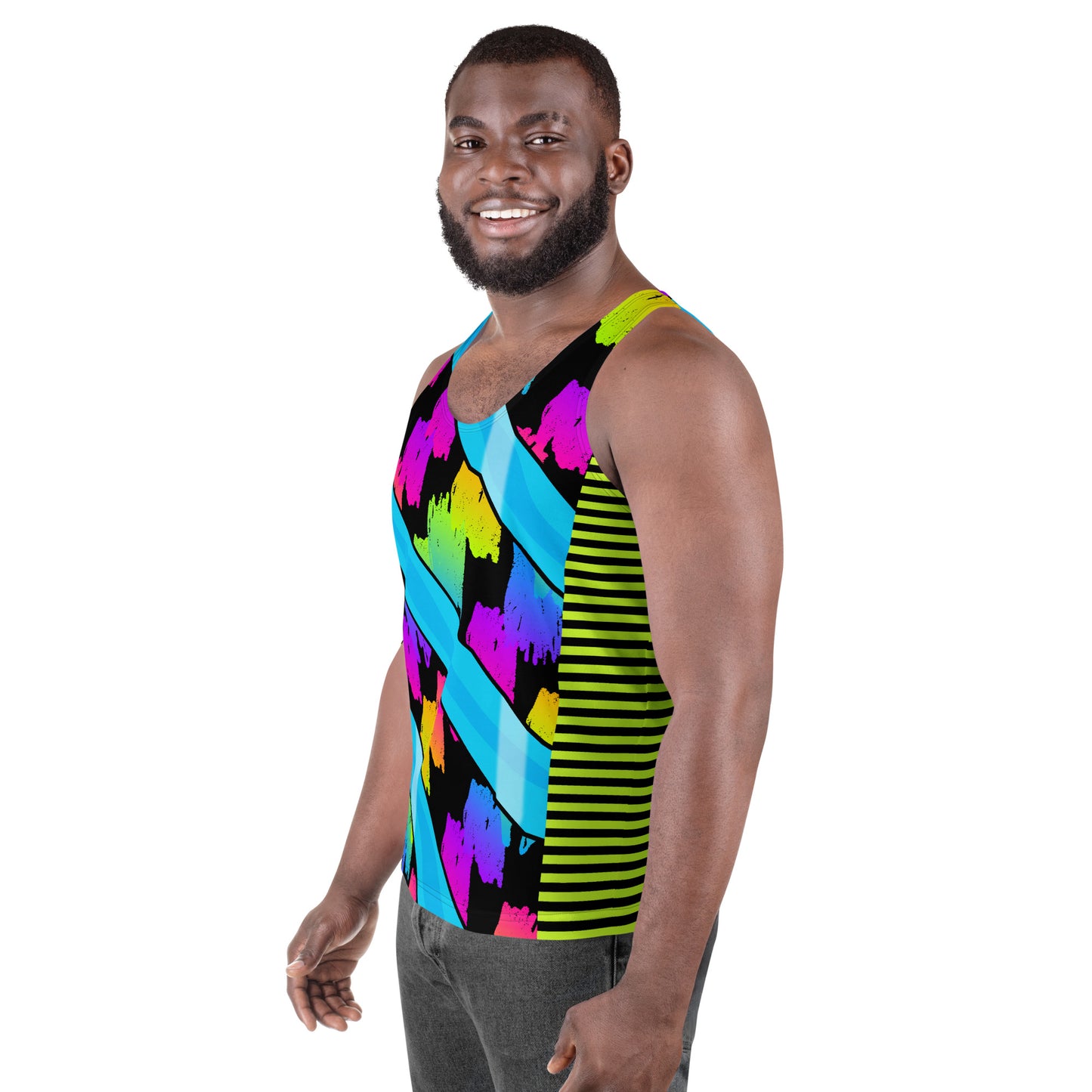 Man wearing a colorful pro wrestling style tank top with rainbow geometric pattern. Right side view.