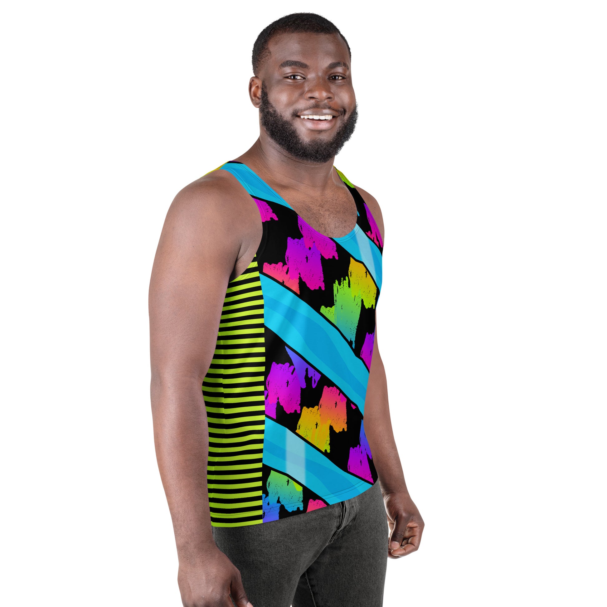 Man wearing a colorful pro wrestling style tank top with rainbow geometric pattern. Left side view.