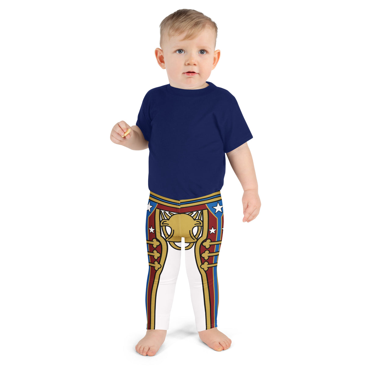 Child wearing a navy blue shirt and patterned wrestling cosplay leggings on a white background