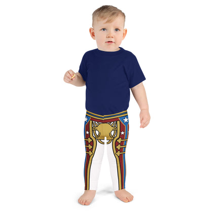 Child wearing a navy blue shirt and patterned wrestling cosplay leggings on a white background