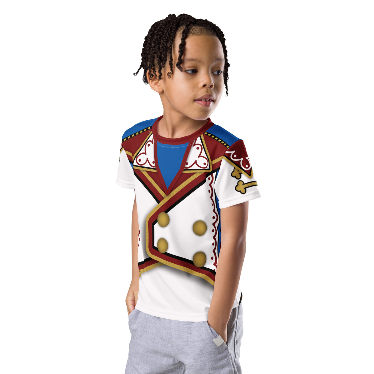 Child wearing a colorful shirt with intricate designs on a white background