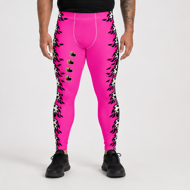 A person wearing bright pink leggings with black and white flame-like side patterns and small gold heart graphics on the front, paired with a black top and black sneakers, photographed against a light gray studio background.