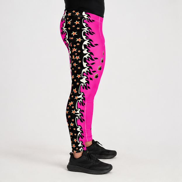 Pink and black patterned leggings worn by a model, featuring a black thigh with white and orange flame-like graphics and gold stars, paired with a bright pink lower leg. The model is wearing black sneakers against a light gray studio background.