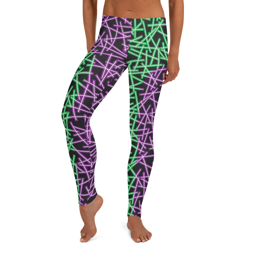 Neoncore style leggings for women with scattering pattern of neon stripes in green and purple on these printed pro wrestling style tights. Mid rise elasticated waistband and ankle length legs in opposite colors with reverse insets.