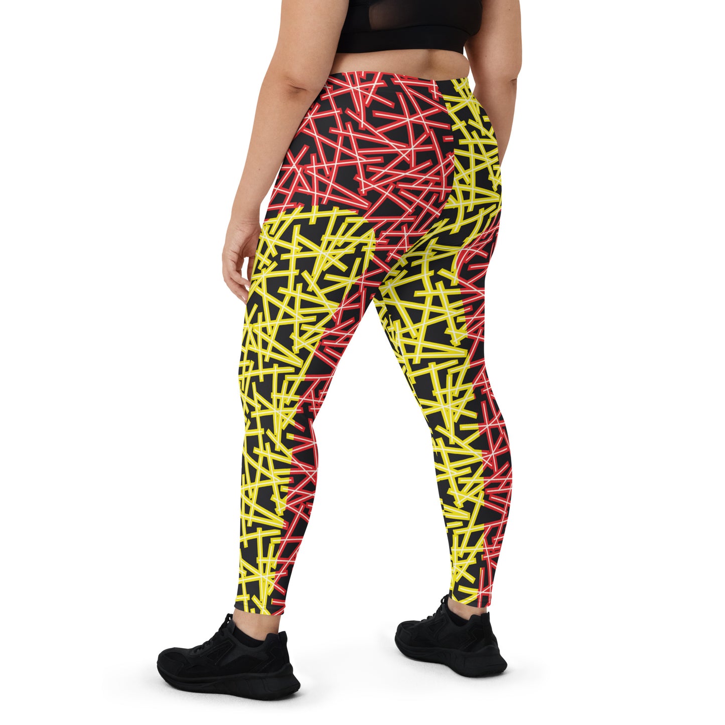 Neoncore style leggings for women with scattering pattern of neon stripes in red and yellow on these printed pro wrestling style tights. Mid rise elasticated waistband and ankle length legs in opposite colors with reverse insets.