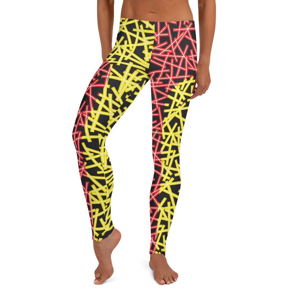 Neoncore style leggings for women with scattering pattern of neon stripes in red and yellow on these printed pro wrestling style tights. Mid rise elasticated waistband and ankle length legs in opposite colors with reverse insets.