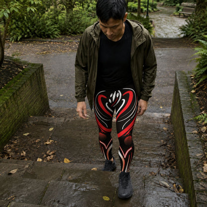 Man walking up some steps wearing the red and black Pulse Grid gym tights for men.
