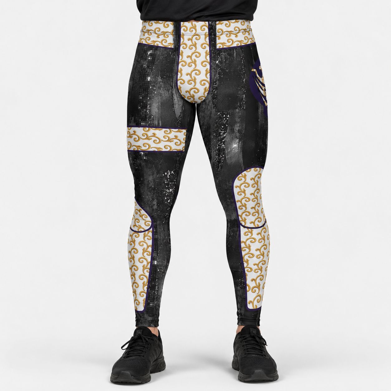 Men's leggings with black, gold, and white pattern on a white background