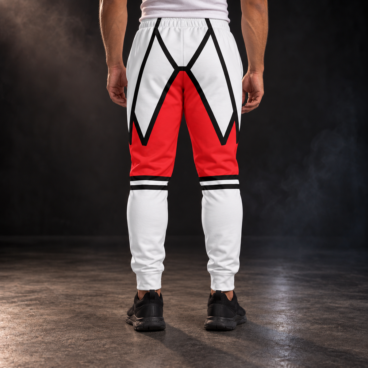 Back view of the Crimson Crest men's wrestling joggers on a dark studio background