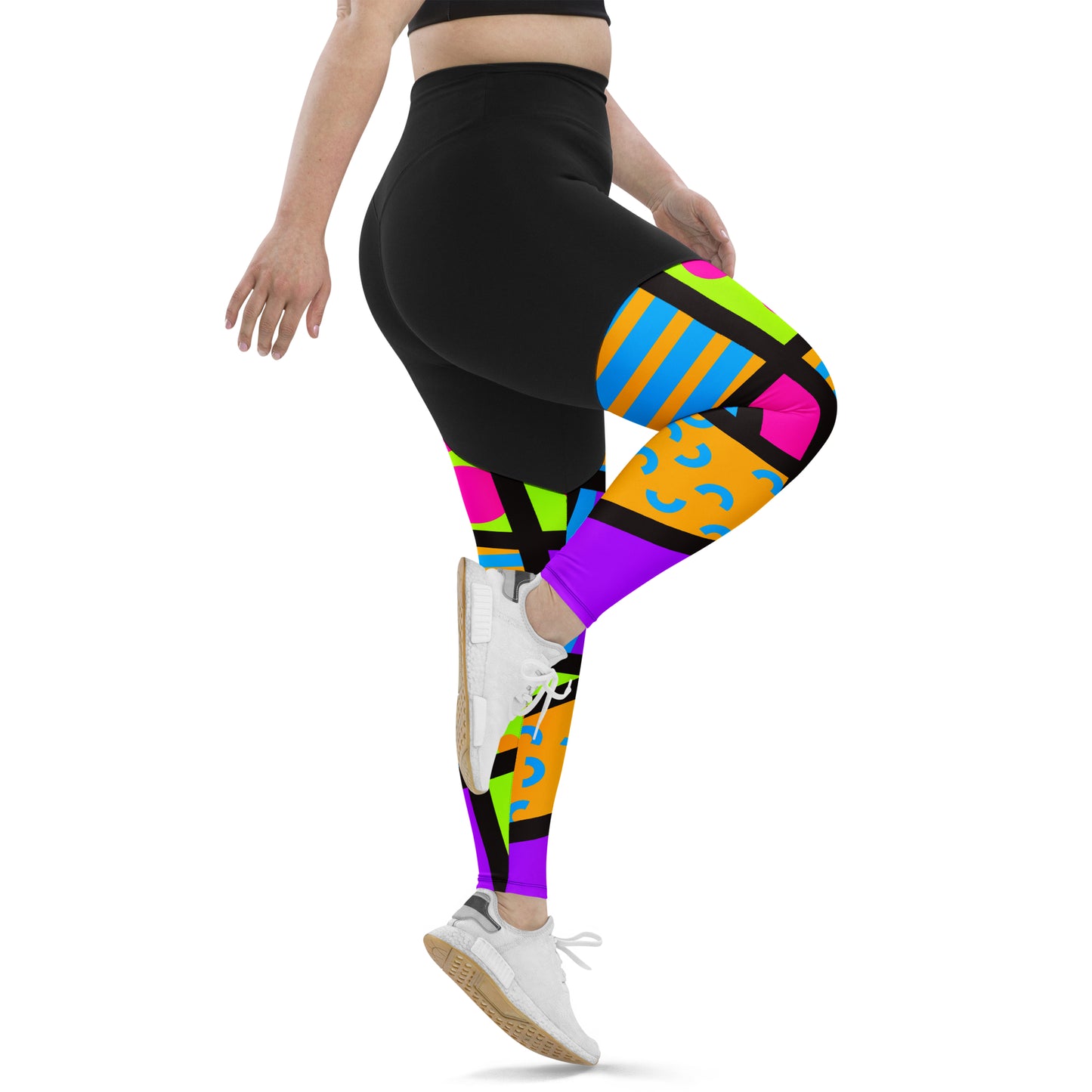 Sports leggings for women with black upper top and geometric popping patterned legs. Compression ankle length gym leggings with high elasticated waistband. Non-see through and squat proof leggings.