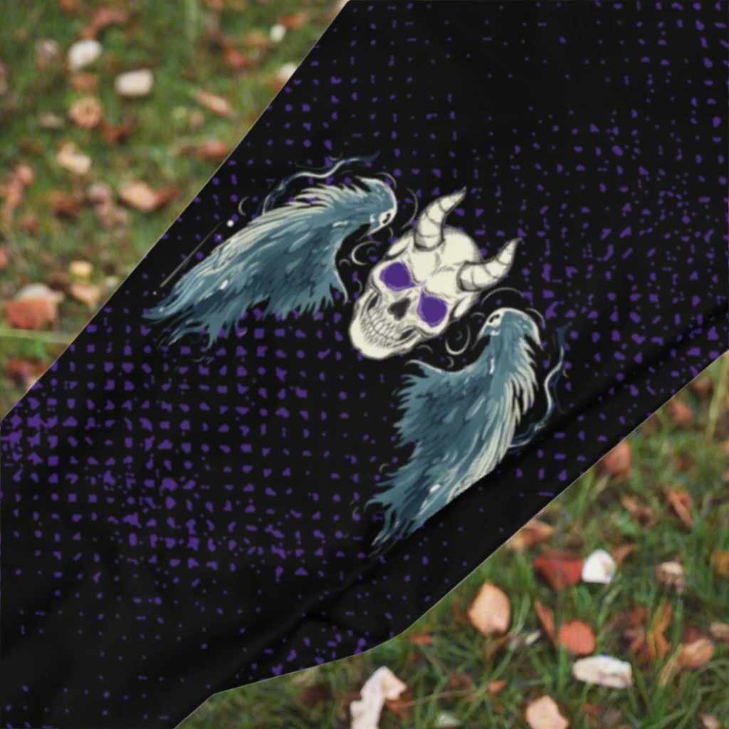 spooky gothic horror pro-wrestling tights with skull and wings on a black and purple distressed background. Mid rise leggings for men with ankle length legs.