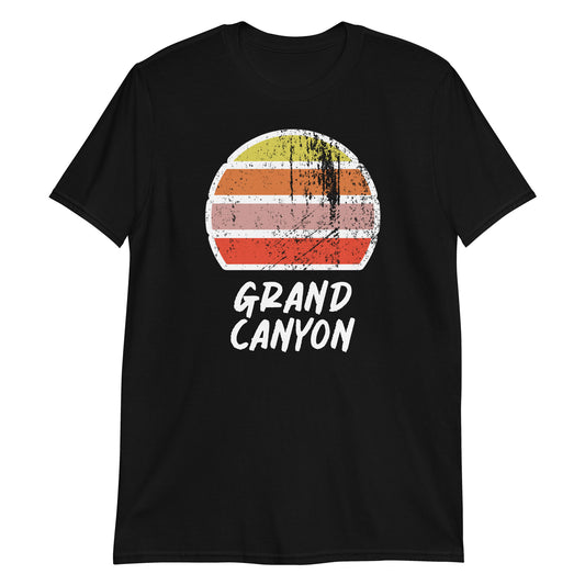 vintage sunset grand canyon graphic cotton t-shirt, with short sleeves and crew neck. Stylised setting sun in a distressed effect in retro colors yellow, orange, pink and above the words Grand Canyon on this black tee by BillingtonPix.