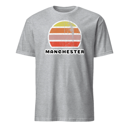 vintage manchester t-shirt in cotton with distressed rising sun in abstract graphic on this short sleeved unisex tee in sport grey.