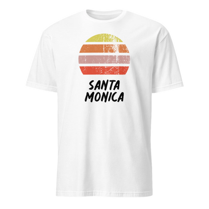 vintage sunset santa monica graphic cotton t-shirt, with short sleeves and crew neck. Stylised setting sun in a distressed effect in retro colors yellow, orange, pink and above the words Santa Monica on this navy tee by BillingtonPix.