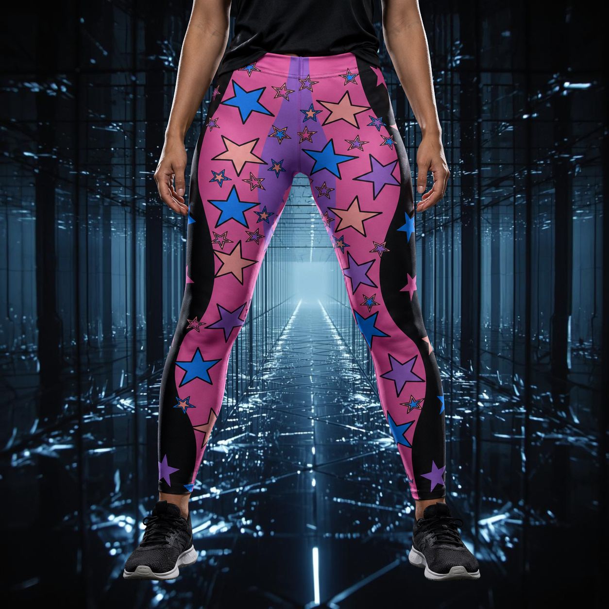 woman standing with pink and purple leggings with blue and peach stars 