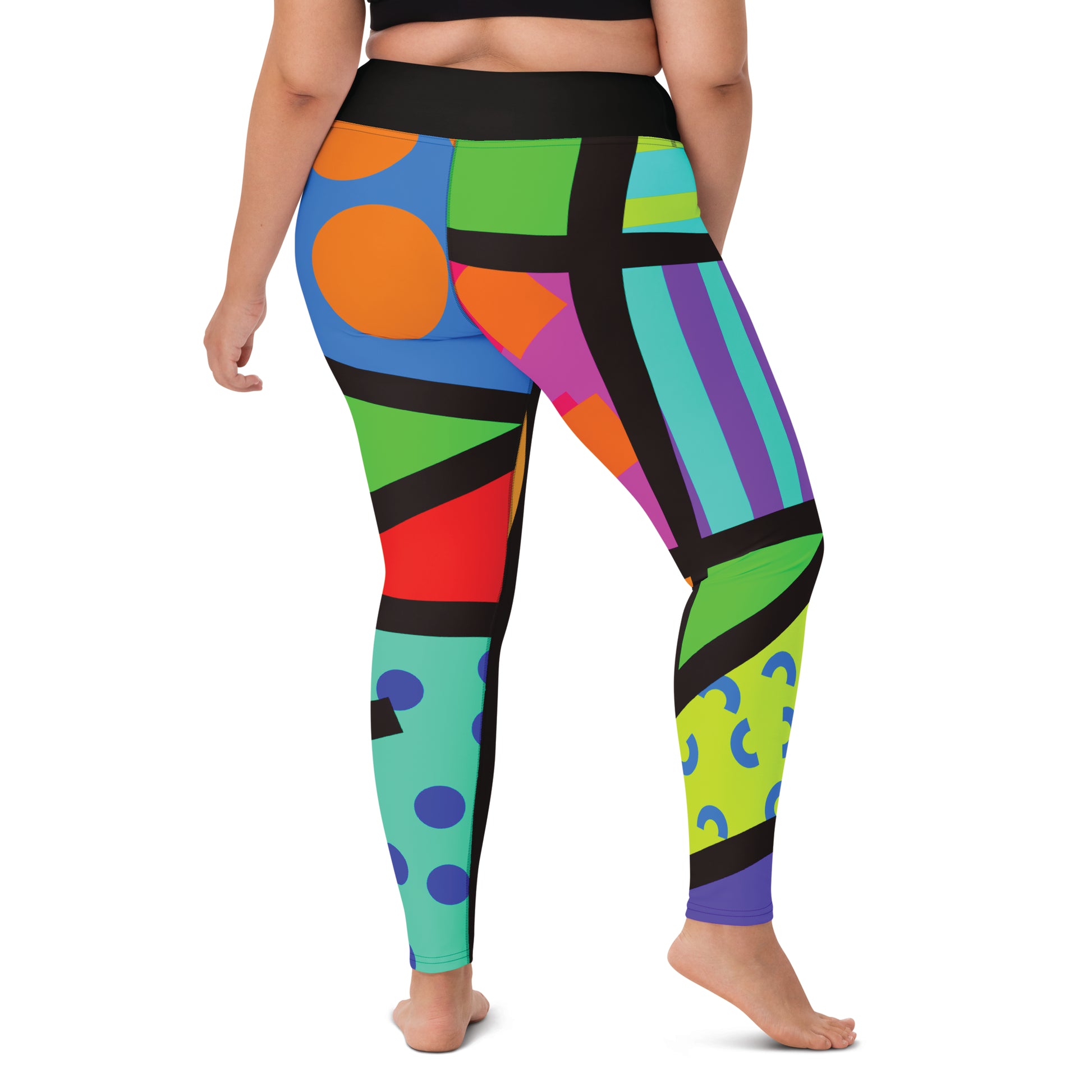 Back view of colorful geometric-patterned rainbow leggings in a design of Tokyo Harajuku and retro 80s Memphis design, worn by a person on a white background