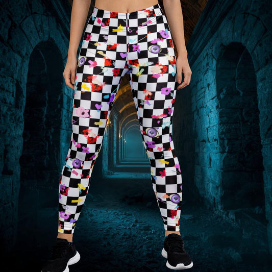 Person wearing colorful checkered pants with a pattern of eyes in a dark, tunnel-like setting.