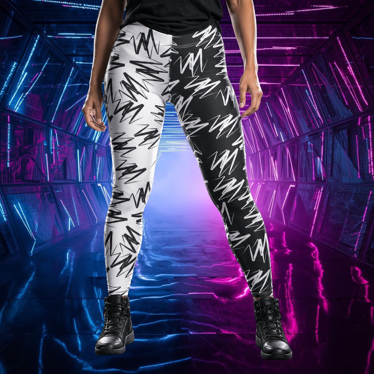 Woman wearig black and white split leggings with zigzag design