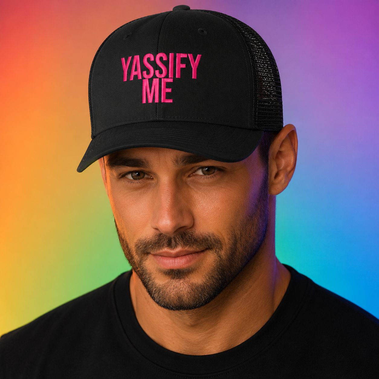 Man wearing a black truckers hat with the inscription, Yassify Me.