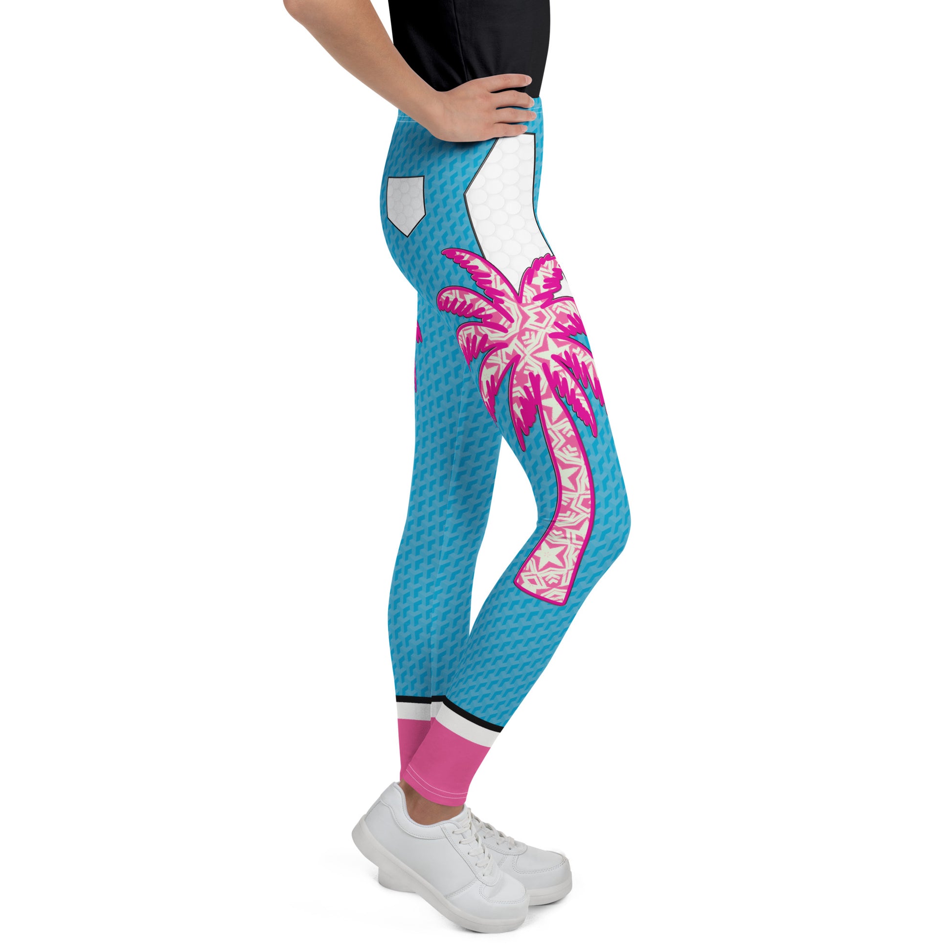 Youth wearing blue and pink Retro Palm Hero cosplay leggings with palm tree graphics.