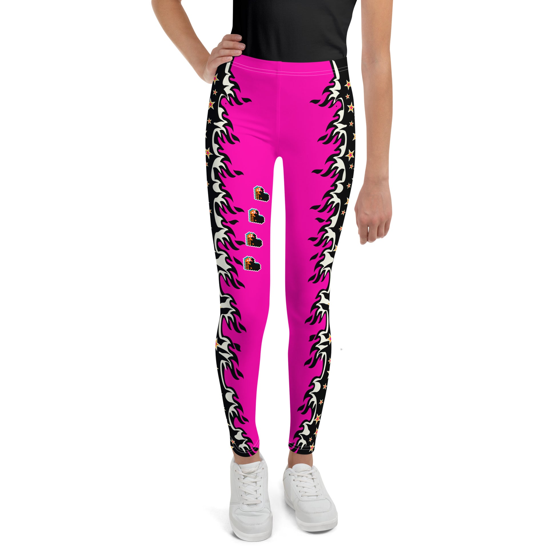 Youth teenager wearing pink cosplay wrestling leggings with a fiery outside edging and love hearts. Facing forward