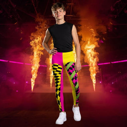 Youth boy wearing yellow and pink leggings with split color design and checked insets with green diagonal stripes