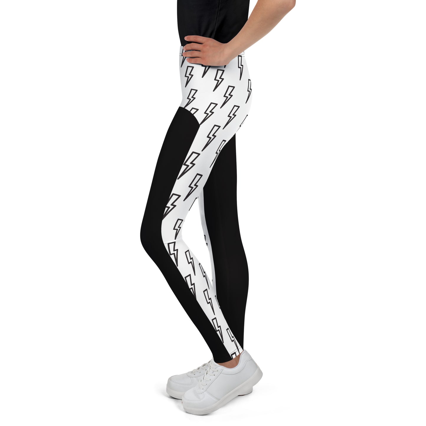Side view of youth wrestling cosplay leggings with lightning bolt print in black and white