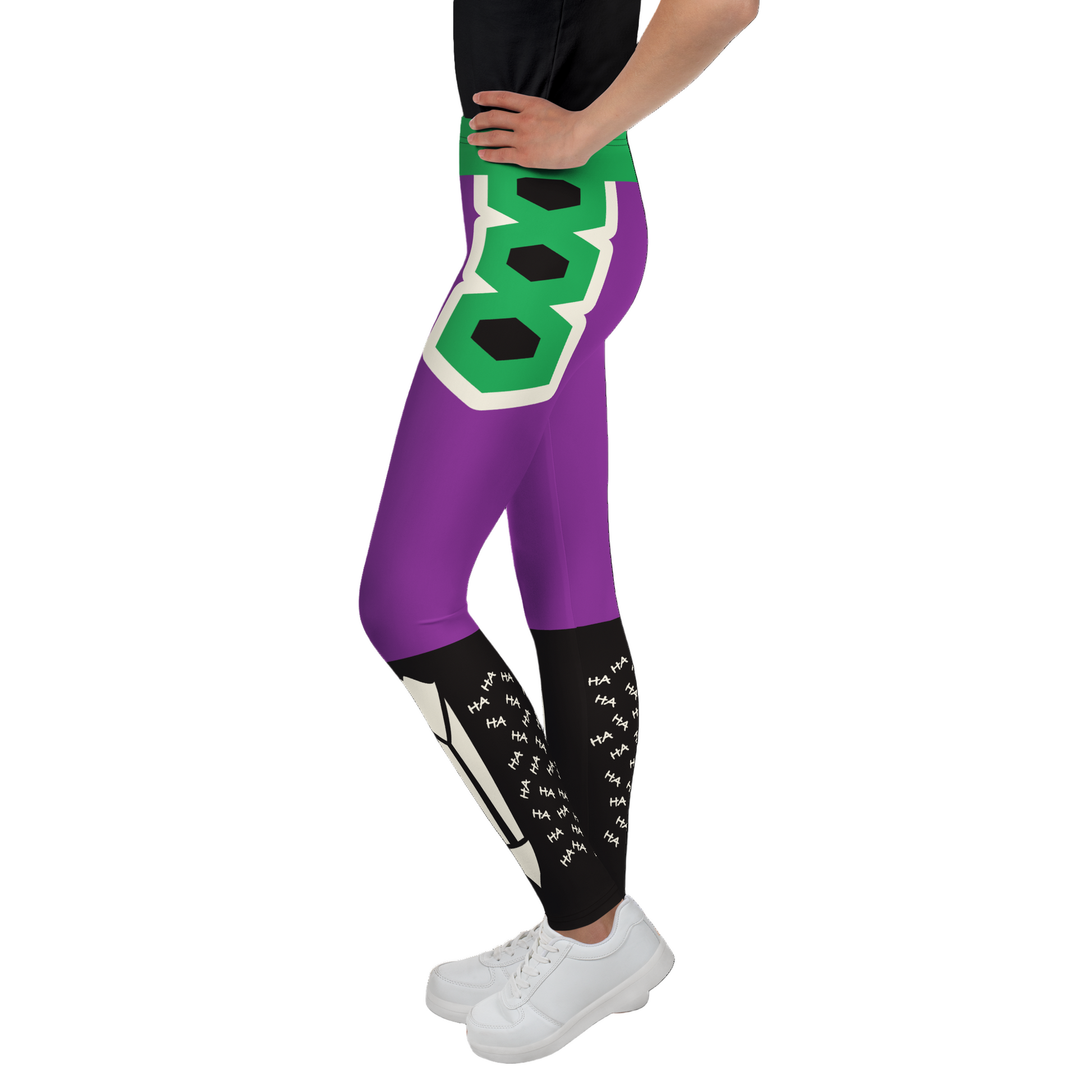 Purple leggings with green and black geometric design worn by a person. Fun ha ha graffiti and skeleton legs