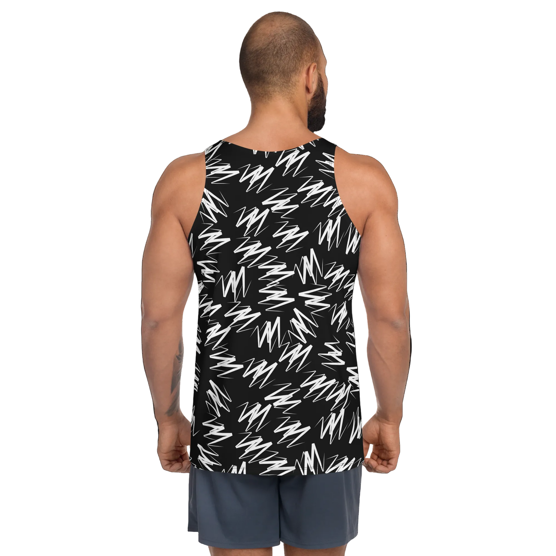Man wearing a black tank top with white geometric pattern on a white background