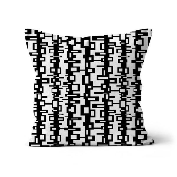 This Mid-Century Modern style couch pillow design consists of a black geometric pattern against a white background.