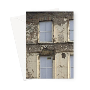Closeup of Devonshire House in Southwark, pre-restoration, showing broken plasterwork and peeling paint in this greeting card