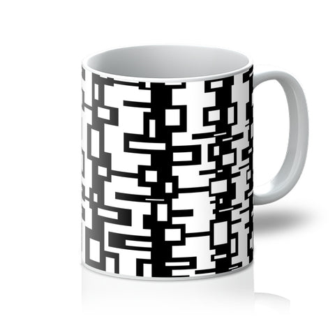 This Mid-Century Modern style design coffee mug consists of black geometric shapes against a white background
