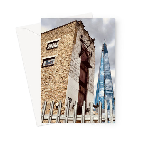 The Shard in juxtaposition with an old Victorian factory building