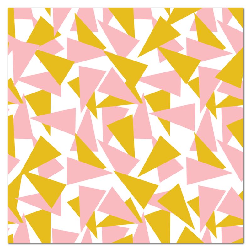 This patterned kitchen table cloth has an abstract triangular pattern in pink and mustard orange against a white background