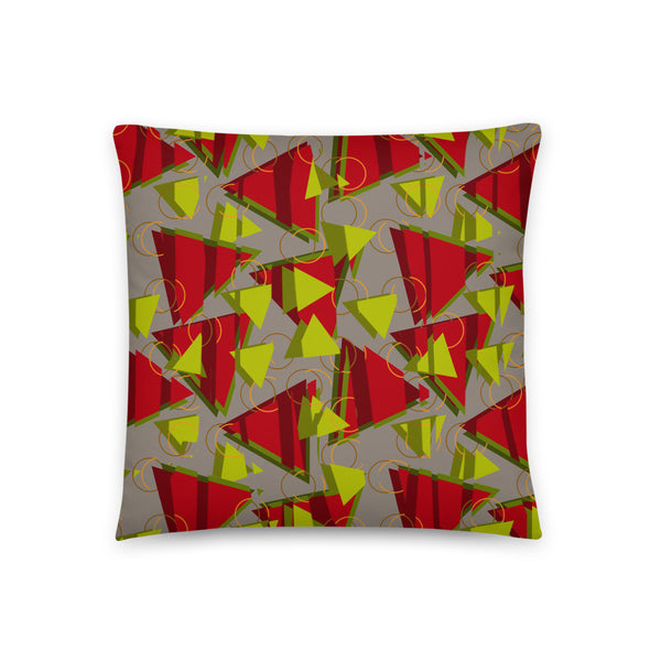 80s Memphis style lime green and red triangle pattern on a soft grey background with orange rings and vertical splits cutting through to add a secondary dimension to this couch pillow cushion