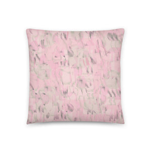 Pink and green pastel tones come together to create a soft contemporary retro patterned sofa cushion or pillow, with hints of 80s Memphis abstract geometric shapes.