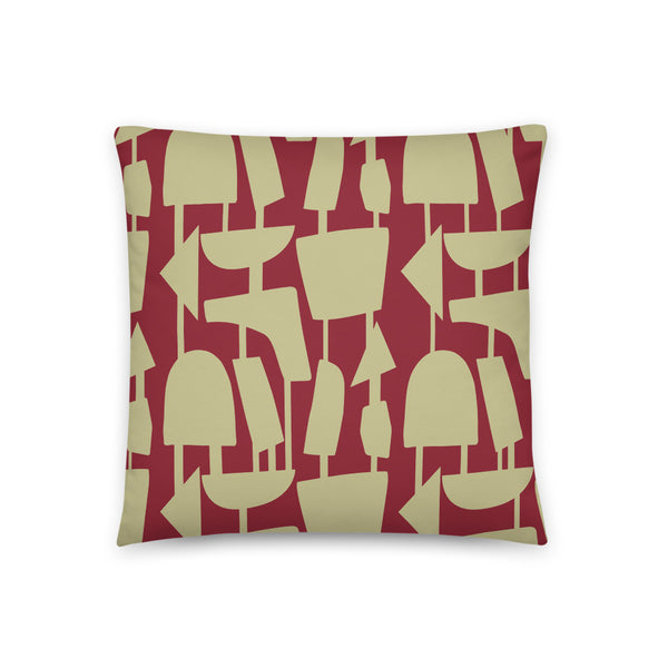 This Mid-Century Modern style sofa pillow consists of cream geometric shapes, connected by narrow tentacles to form and almost hanging mobile type abstract pattern on a vermillion red background