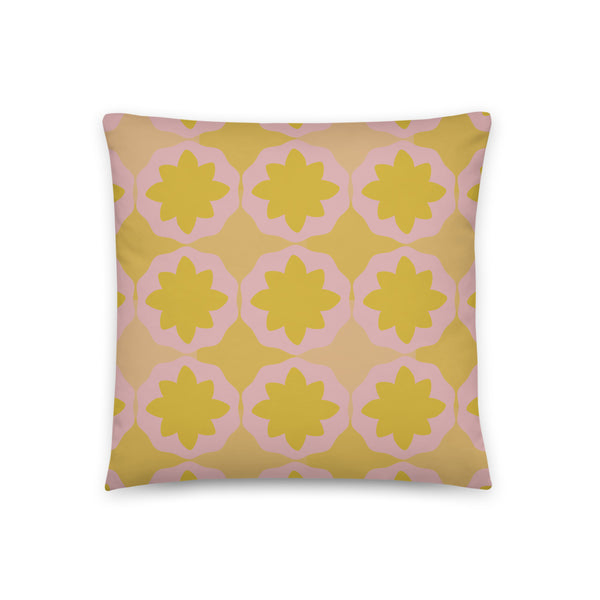 This Mid-Century Modern style sofa pillow consists of colorful geometric floral shapes in tones of pink and orange in a retro aesthetic abstract pattern mid century design