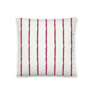 This Mid-Century Modern style scatter cushion consists of jagged vertical magenta purple stripes against a pale cream background