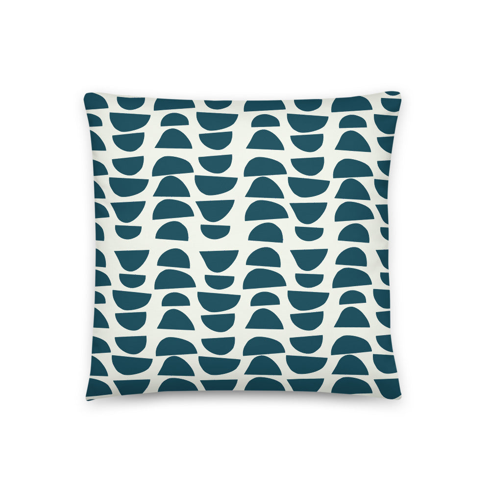 This classic patterned retro style design has stacked abstract shapes in a vibrant blue teal, alternating in reverse against a gorgeous pale cream background