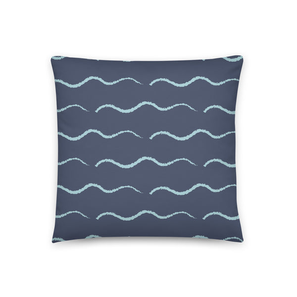 This Mid-Century Modern style couch pillow design consists of a series of horizontal seafoam blue / green wave shapes against a navy blue background
