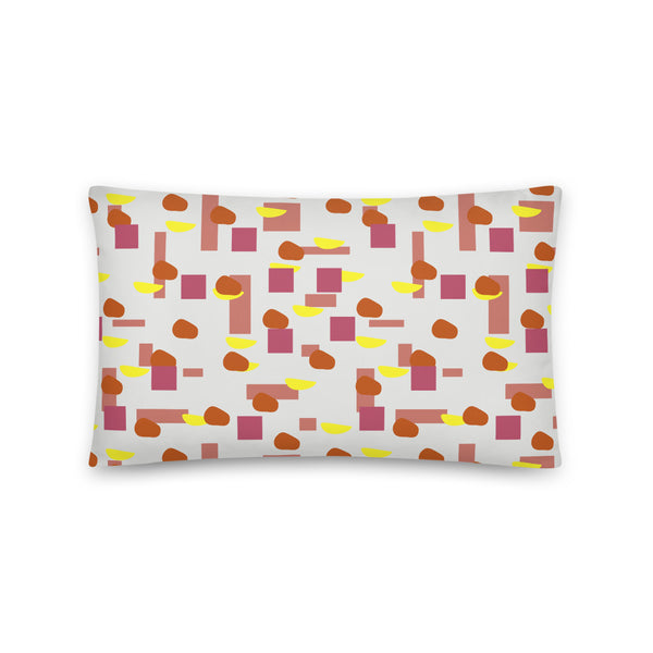 50s style Mid Century Modern geometric shapes in retro tones of pink, crimson, orange and yellow against a cream background on this throw cushion by BillingtonPix