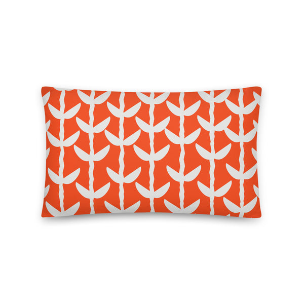 This striking Mid-Century Modern style couch pillow design consists of a series of cream coloured leaves and stems against a deep orange background