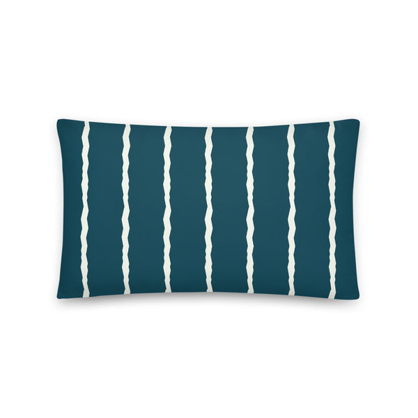 This Mid-Century Modern style scatter cushion consists of jagged vertical pale cream stripes against a blue teal background