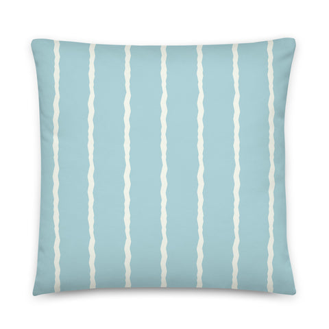 This retro style scatter cushion consists of jagged vertical pale cream stripes against a seafoam blue background