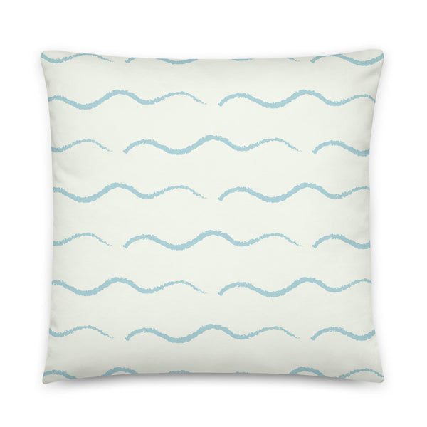This retro style couch pillow design consists of a series of horizontal sea-foam blue wave shapes against a pale cream background