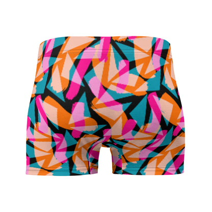 Harajuku patterned LGBT boxer briefs with vibrant geometric and abstract tones of pink, orange and turquoise against a black background on these men's boxers by BillingtonPix